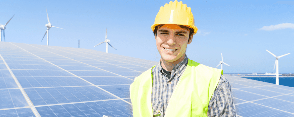 Auf diesem Bild ist eine Person zu sehen, die ein Duales Studium 
für Energiewirtschaft absolviert. Diese Person ist damit beschäftigt, die Energieversorgung für eine Gemeinschaft sicherzustellen.